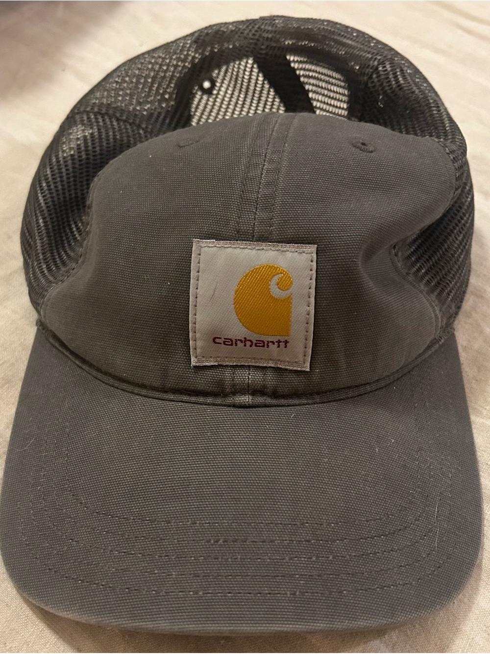 Carhartt Gray Mesh Trucker Cap with Yellow Logo Patch
